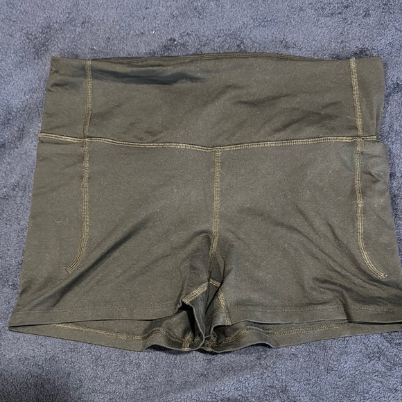 Under Armour Pants - Black Under Armour Women's athletic Shorts and tank top in medium.